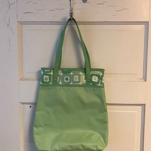 Clinique handbag. Green plastic nylon bag.